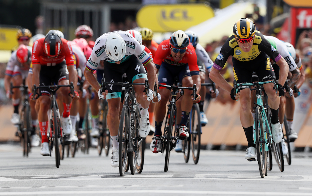 Team Jumbo-Visma rider Mike Teunissen of the Netherlands wins the stage ahead of BORA-Hansgrohe rider Peter Sagan of Slovakia in the Stage I of Le Tour de France in Brussels, July 6, 2019. u00e2u20acu201d Reuters picnn