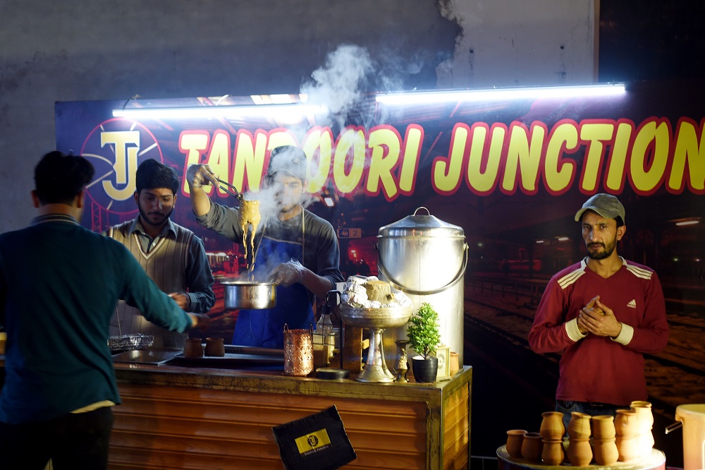 In this picture taken on March 29, 2019, a Pakistani worker prepares tandoori tea at a stall of a market in Islamabad. u00e2u20acu201d AFP pic
