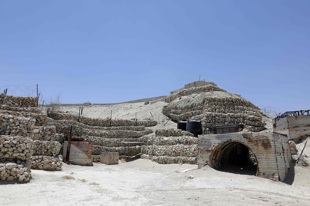 A picture taken on July 4, 2019 shows an abandoned Israeli army outpost next to the Jordan River in the occupied West Bank. — AFP pic          