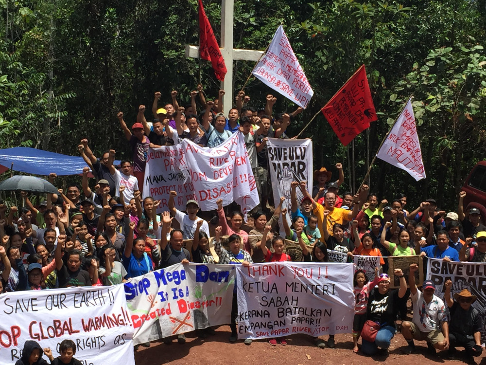 Representatives from nine villagers in the Ulu Papar area attend a u00e2u20acu02dcblessing of the crossu00e2u20acu2122 ceremony at the proposed site of the Papar dam July 31, 2019. u00e2u20acu201d Picture by Julia Chan 
