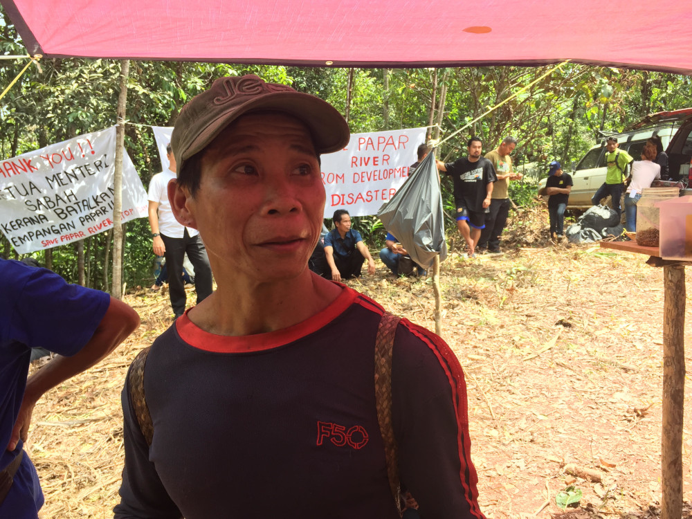 People like Jinius Gisain are pleading with the government to leave their livelihood alone. — Picture by Julia Chan 