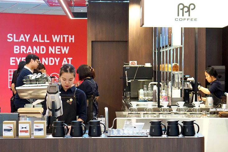 The new PPP Coffee store at Funan has a modern, metallic look.
