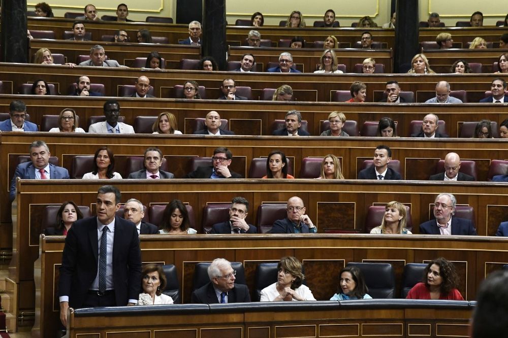 Candidate for re-election as prime minister for a second term, socialist Pedro Sanchez shouts his vote during the second day of the parliamentary investiture debate to vote for a premier at the Spanish Congress in Madrid on July 23, 2019. u00e2u20acu201d AFP pic