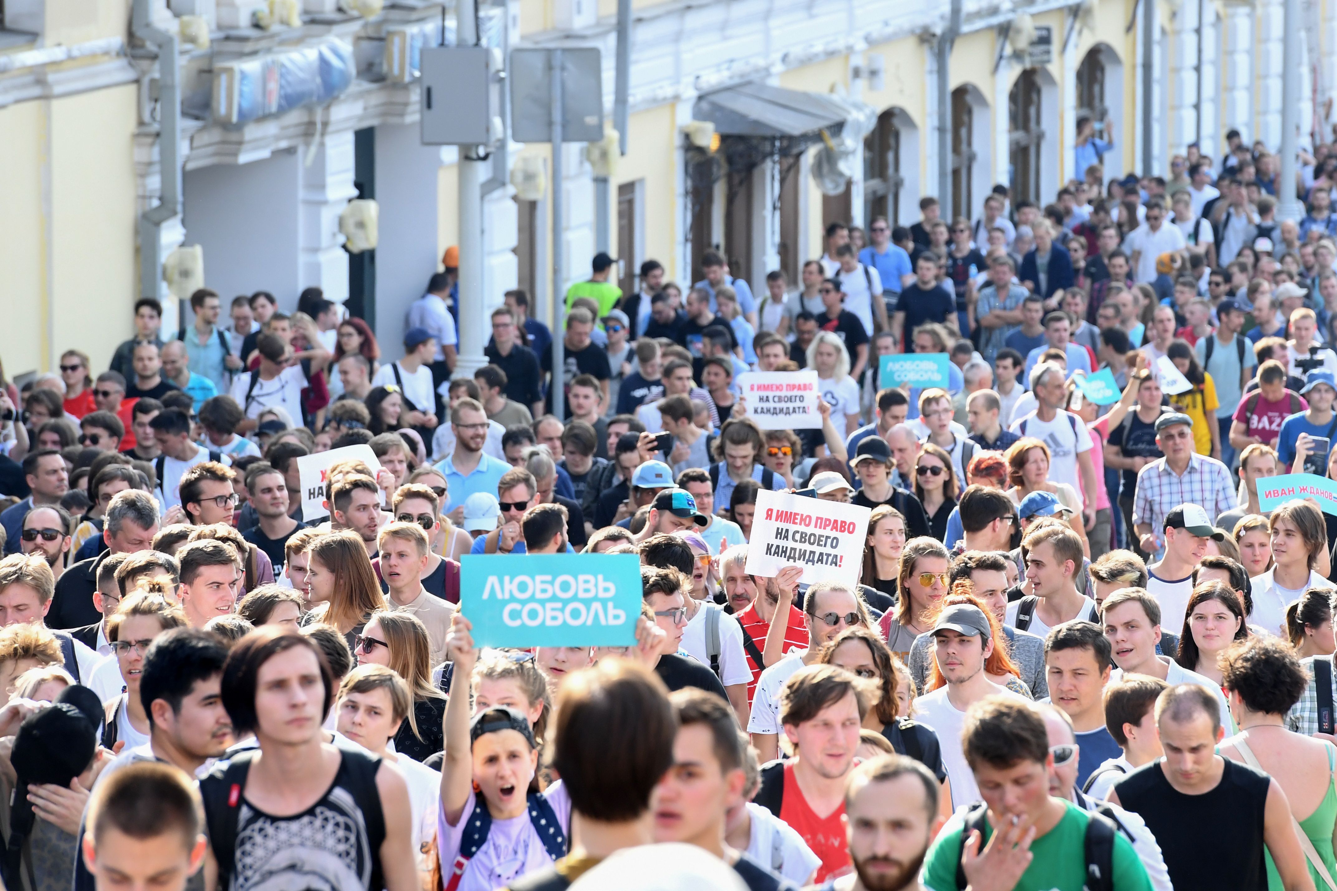 Protesters walk in downtown Moscow during an unauthorised rally demanding independent and opposition candidates be allowed to run for office in local election in September, July 27, 2019. u00e2u20acu201d AFP pic       