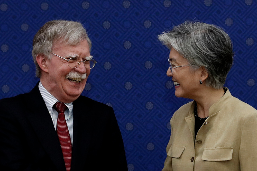 South Korean Foreign Minister Kang Kyung-wha smiles with US National Security Advisor John Bolton during a meeting at the foreign ministry in Seoul July 24, 2019. u00e2u20acu201d AFP pic 
