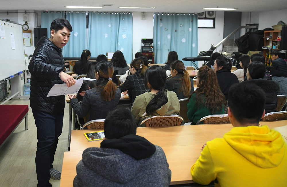 This picture taken on March 22, 2019 shows adult students studying in a lesson at Wooridul School in Seoul, an educational haven for North Korean defectors too old to go to appropriate state schools. u00e2u20acu201d AFP pic       