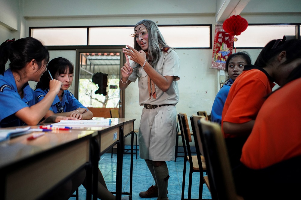 Teerapong Meesataya, 29, known as teacher Bally teaches English in a classroom at the Prasartratprachakit School in Ratchaburi Province, Thailand July 10, 2019. — Reuters pic