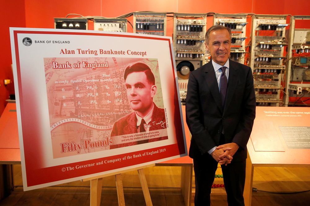 Bank of England governor Mark Carney presents the image of mathematician Alan Turing who will appear on a new 50 pound note at the Science and Industry Museum in Manchester, July 15, 2019. u00e2u20acu201d Reuters pic