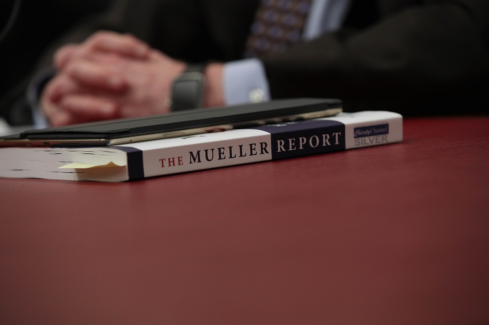 A copy of the Mueller Report is seen as former US Attorney Andrew McCarthy testifies during a hearing before the House (Select) Intelligence Committee on Capitol Hill in Washington June 12, 2019. u00e2u20acu201d AFP pic            