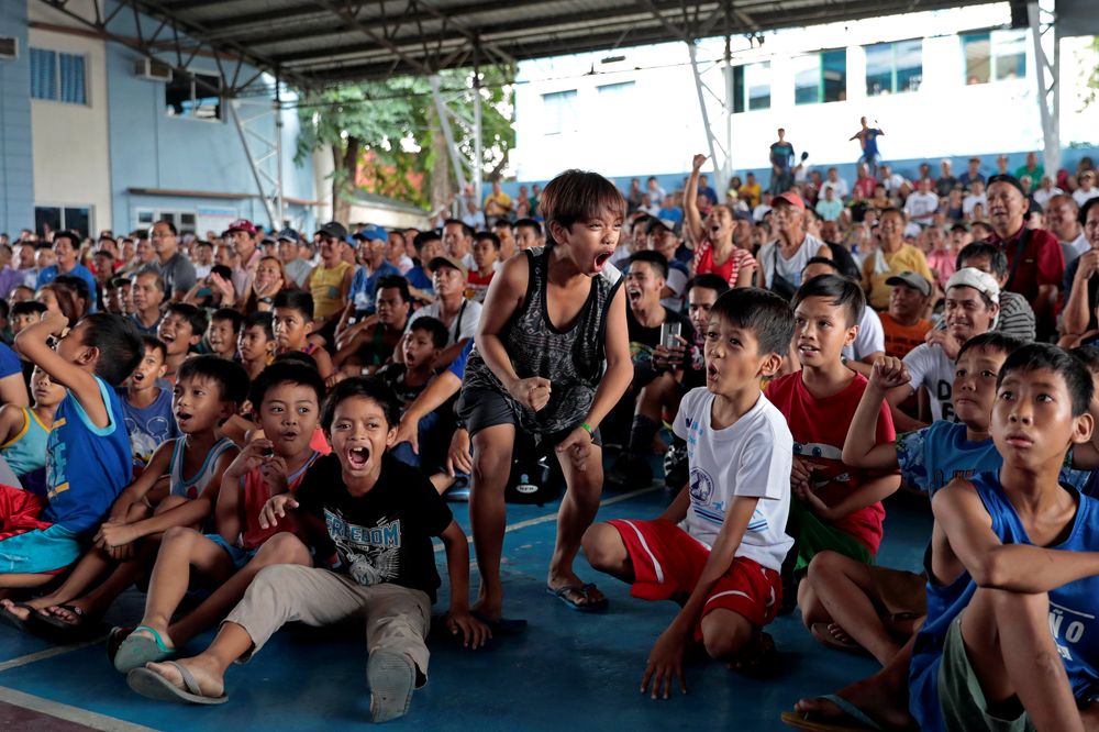 Filipino boxing fans react as they watch the WBA Welterweight match between Philippine boxing icon Manny Pacquiao and Keith Thurman of the US in a live public viewing in Marikina, Philippines, July 21, 2019. u00e2u20acu201d Reuters pic