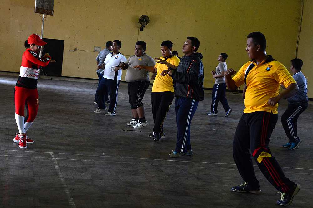 Indonesian police officers perform aerobics during a weight-loss programme in Mojokerto, East Java province July 25, 2019. u00e2u20acu201d Reuters pic