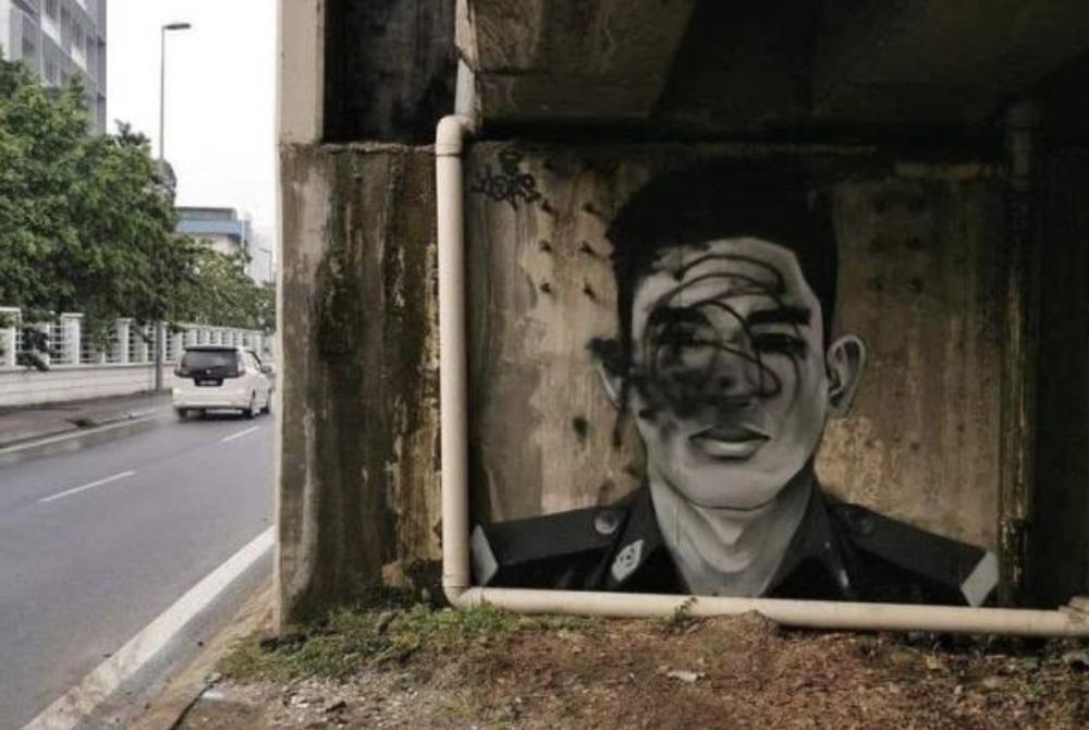Mohammad Hamdan lambasted vandals who defaced slain firefighter Adibu00e2u20acu2122s mural in Shah Alam. u00e2u20acu201d Picture via Twitter