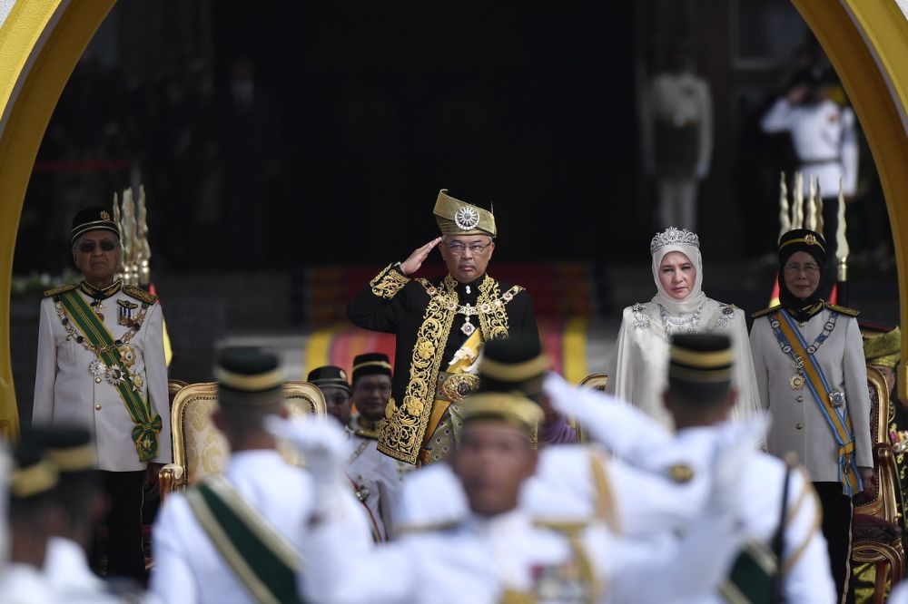 The Yang di-Pertuan Agong salutes members of the Malaysian Armed Forces during his installation ceremony. u00e2u20acu201d Bernama pic