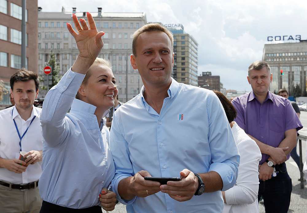 Russian opposition leader Alexei Navalny and his wife Yulia attend a rally in Moscow July 20, 2019. u00e2u20acu201d Reuters pic