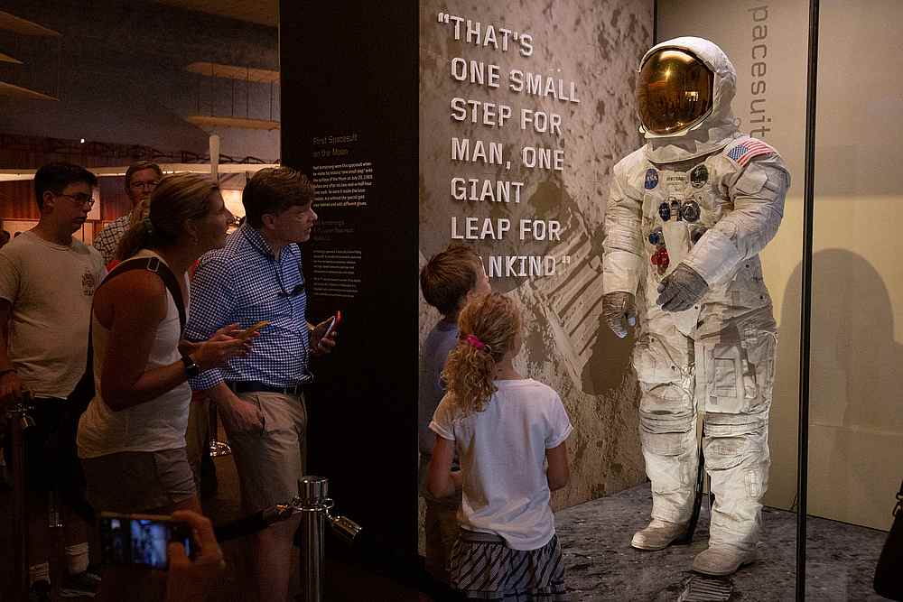 Visitors look at Neil Armstrong's Apollo 11 spacesuit after it was unveiled for the first time in thirteen years, at the Smithsonian National Air and Space Museum in Washington July 16, 2019. u00e2u20acu201d AFP pic
