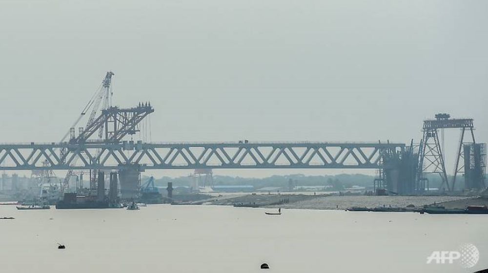 In this photograph taken on Sept 13, 2018, Padma Bridge is pictured under construction at the Janjira point in Shariatpur. u00e2u20acu201d AFP pic