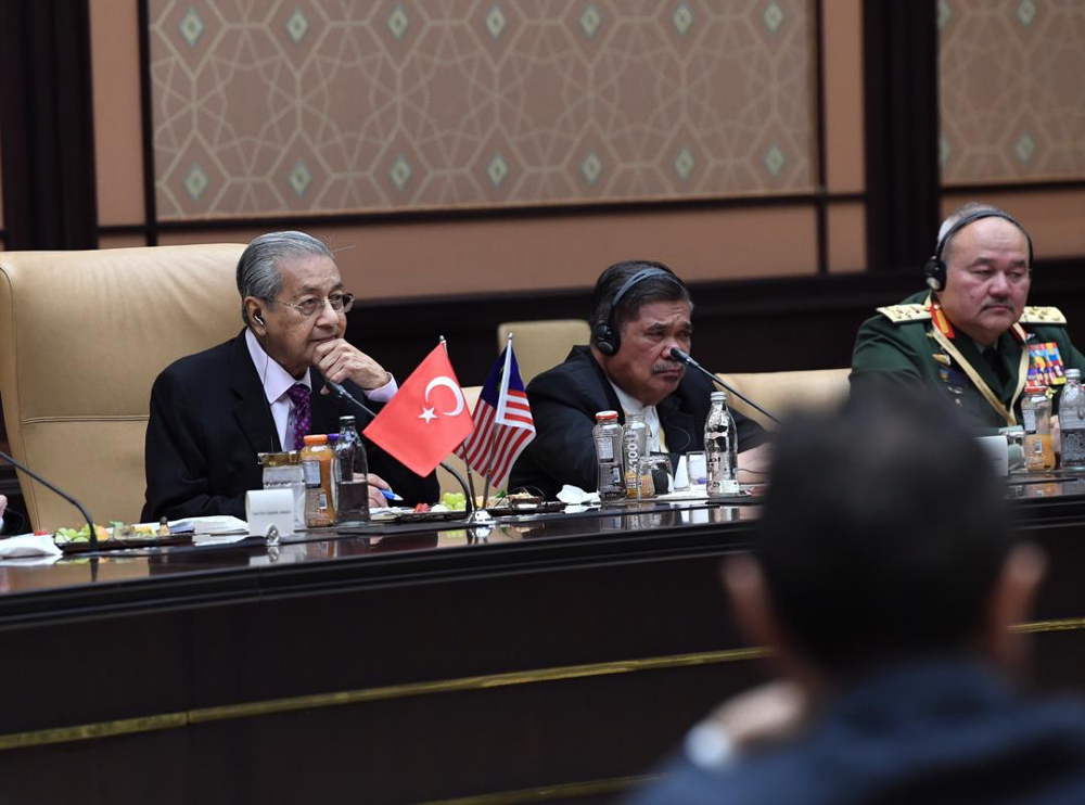 Prime Minister Tun Dr Mahathir Mohamad and Defence Minister Mohamad Sabu during a meeting with their Turkish counterparts at the Presidential Complex in Ankara July 25, 2019. — Bernama pic