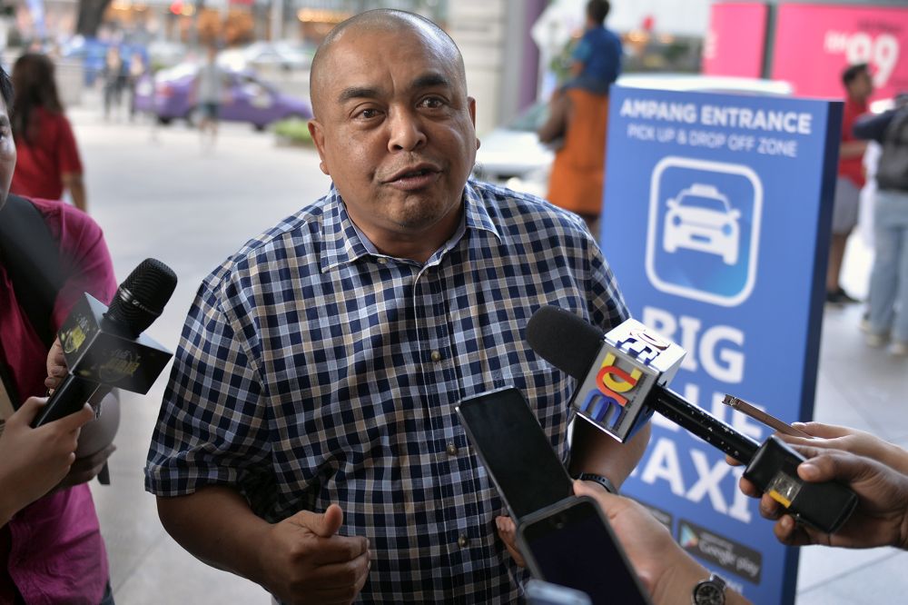 Big Blue Taxi Facilities Sdn Bhd founder Datuk Shamsubahrin Ismail speaks to reporters at Suria KLCC, Kuala Lumpur July 12, 2019. u00e2u20acu201d Picture by Mukhriz Hazim