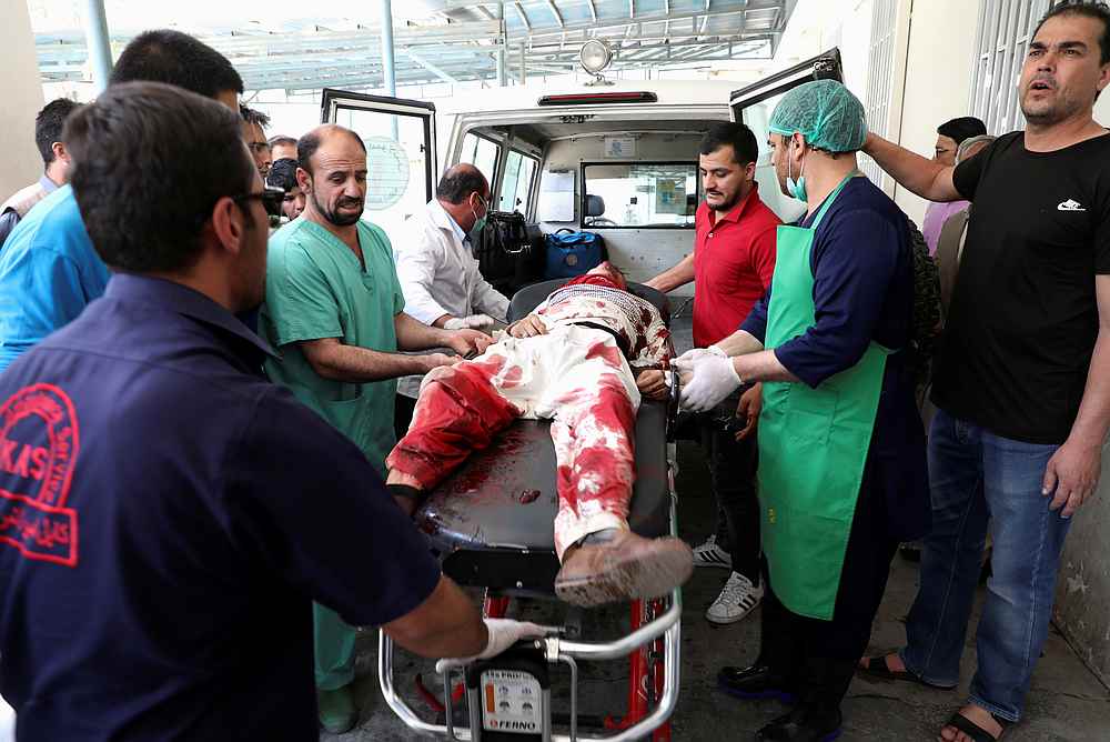 A wounded man is transferred from an ambulance to a hospital after a blast in Kabul, Afghanistan July 25, 2019.  u00e2u20acu201d Reuters pic