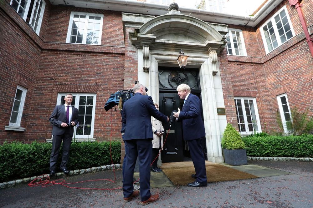 Britainu00e2u20acu2122s Prime Minister Boris Johnson gives an interview on arrival at Stormont House, Belfast for talks on July 31, 2019. u00e2u20acu201d AFP pic