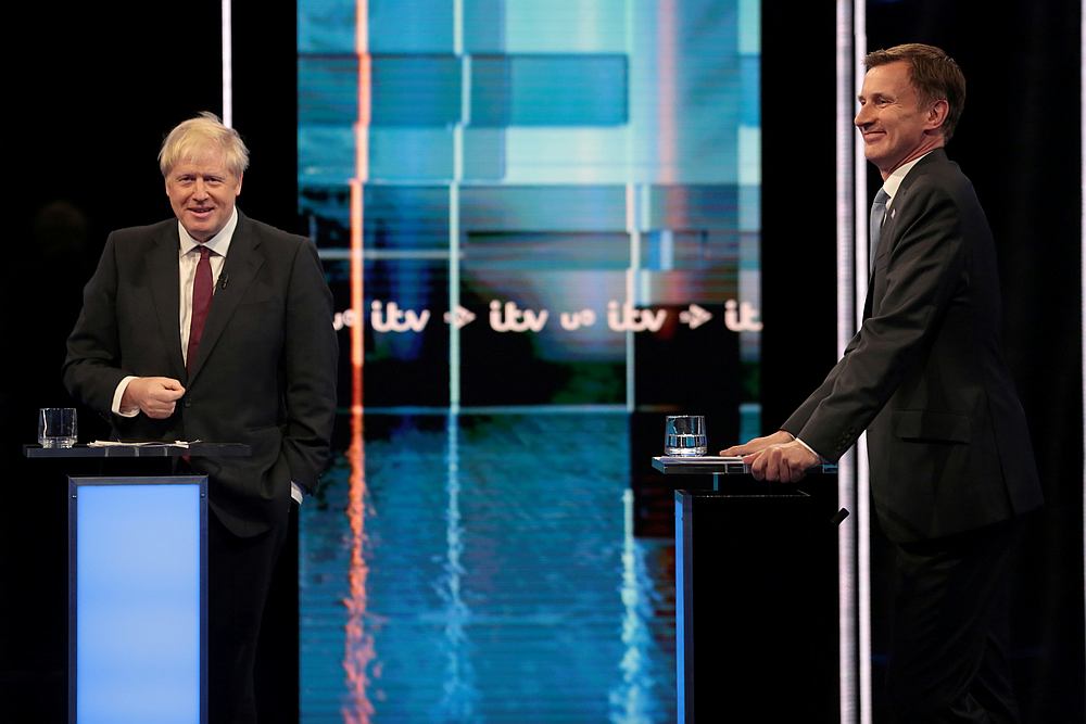 Boris Johnson and Jeremy Hunt attend Britainu00e2u20acu2122s Next Prime Minister: The ITV Debate at MediaCityUK in Salford July 9, 2019. u00e2u20acu201d Matt Frost/ITV handout via Reuters