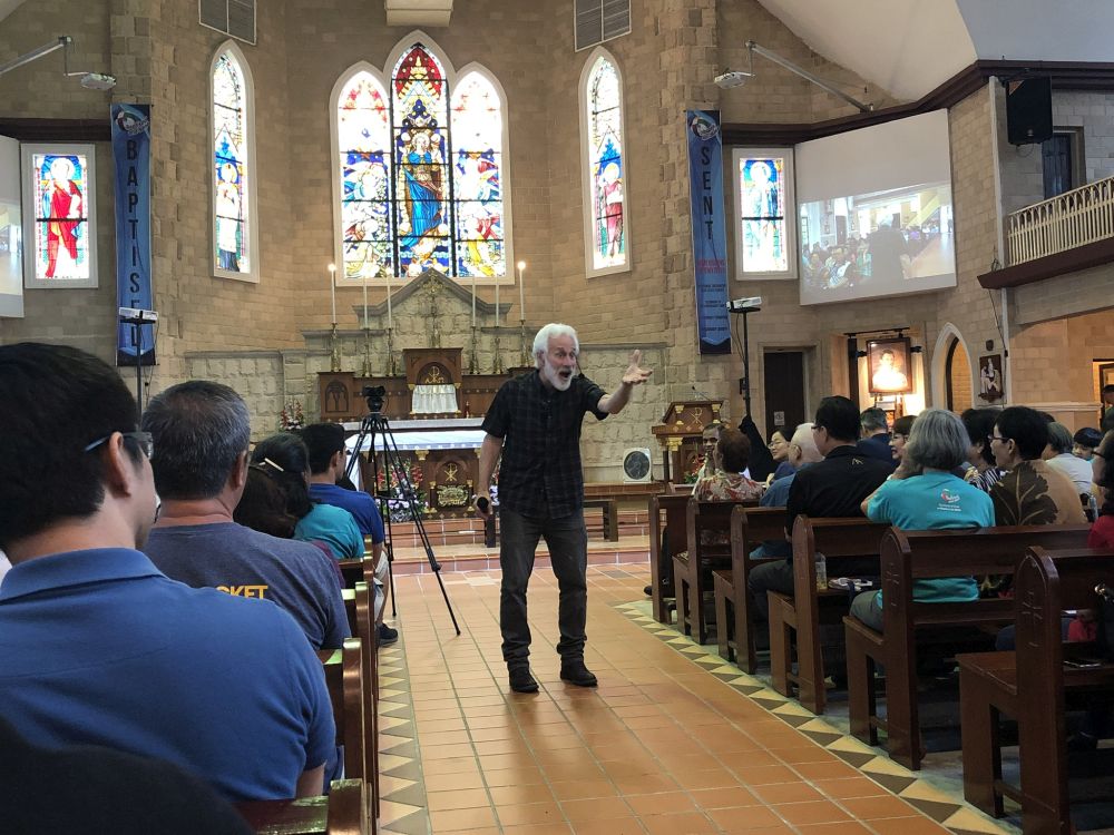 Bruce Kuhn speaking to some of the parishioners after his workshop at the Church of the Immaculate Conception. u00e2u20acu201d Picture by Opalyn Moknn
