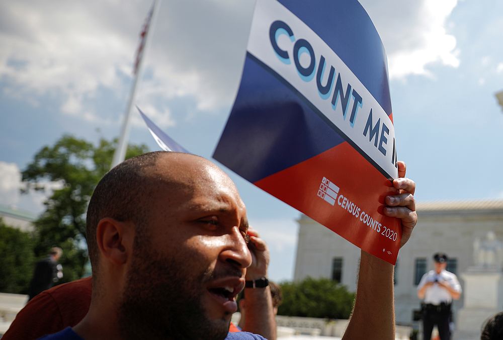 A protester holds a sign outside the US Supreme Court, where the court ruled against US President Donald Trump's attempt to add a citizenship question to the 2020 census, in Washington June 27, 2019. u00e2u20acu201d Reuters pic