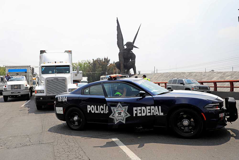 Members of the Federal Police the Mexico-Pachuca highway as they protest against the government's decision to force them to become National Guard members, on the outskirts of Mexico City, Mexico July 4, 2019. u00e2u20acu201d Reuters pic