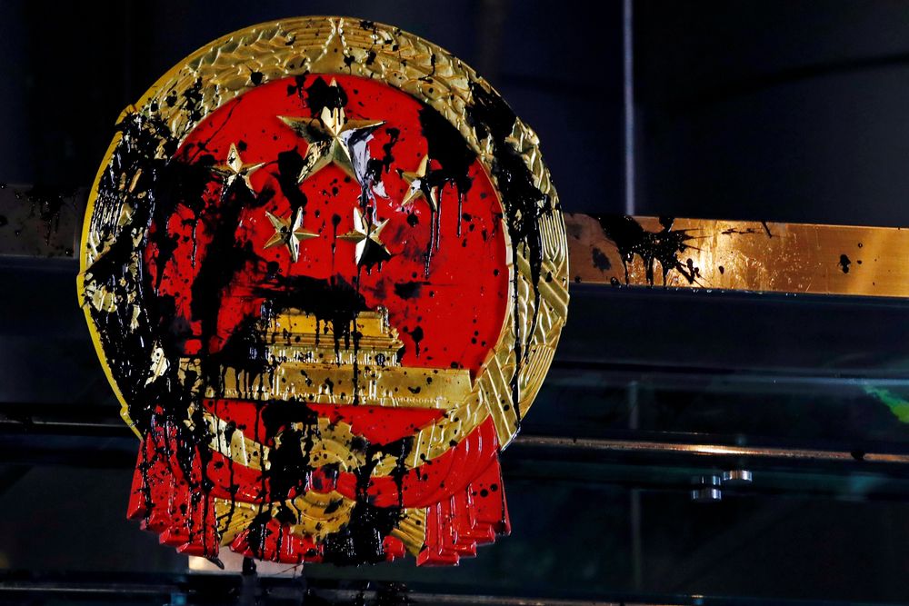A National Emblem splashed with paint after anti-extradition bill protest is seen outside Chinese Liaison Office in Hong Kong, China July 21, 2019. u00e2u20acu201d Reuters pic