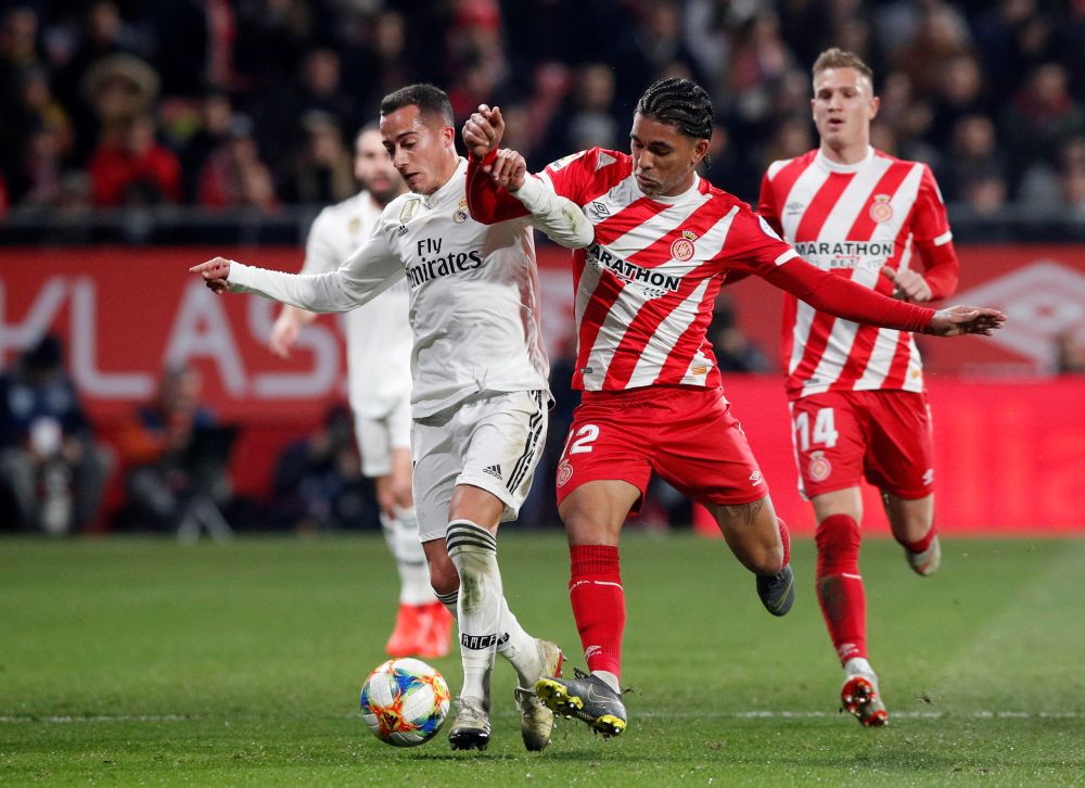 Girona's Douglas Luiz (right) in action with Real Madrid's Lucas Vazquez January 31, 2019. u00e2u20acu201d Reuters pic