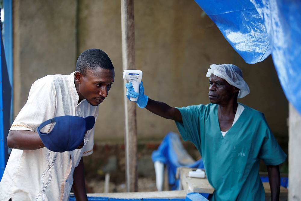 A health worker measures the temperature of a man entering the Alima (Alliance for International Medical Action) Ebola treatment centre in Beni, in the Democratic Republic of Congo April 1, 2019. u00e2u20acu201d Reuters pic