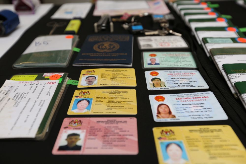 Vietnamese passports and other travel documents are pictured during a media conference in Putrajaya July 19, 2019. u00e2u20acu201d Picture by Choo Choy May