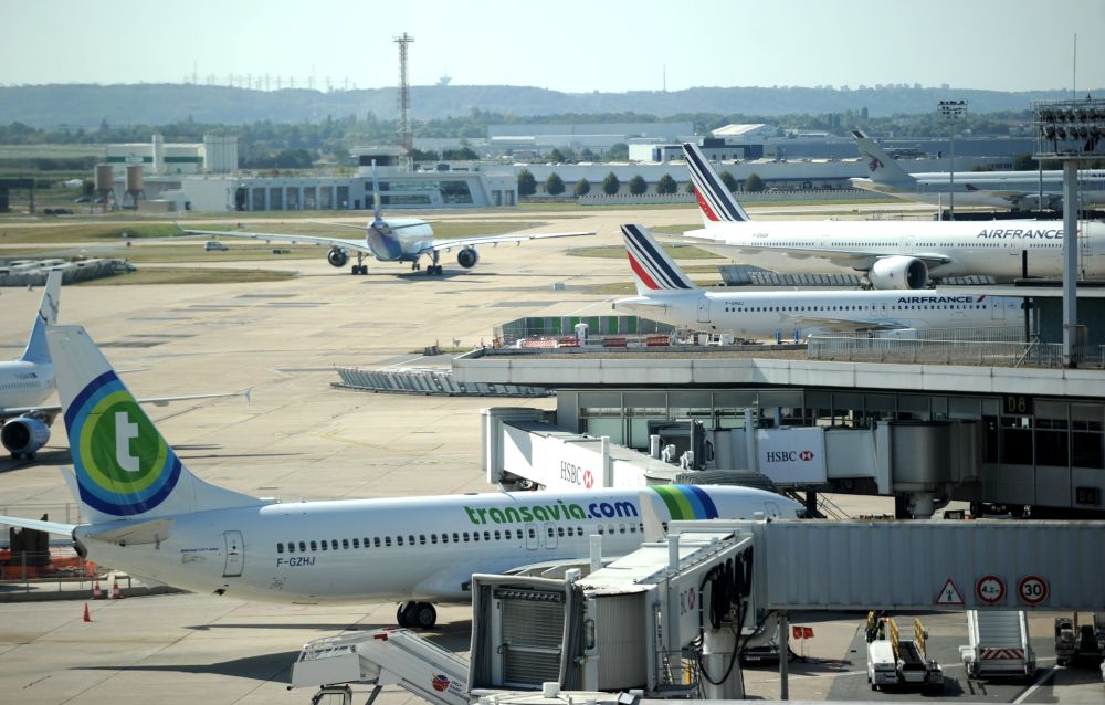 The French government plans to impose a tax of up to u00e2u201au00ac18 on plane tickets for all flights from airports in France to fund less-polluting transportation projects. u00e2u20acu201d AFP pic