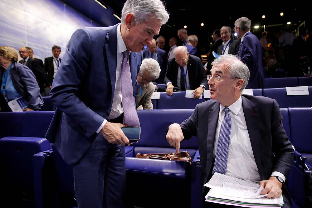 Fed Chairman Jerome Powell (left) talks with Governor of the Bank of France Francois Villeroy de Galhau at the 'Bretton Woods: 75 years later' conference in Paris July 16, 2019. u00e2u20acu201d Reuters pic