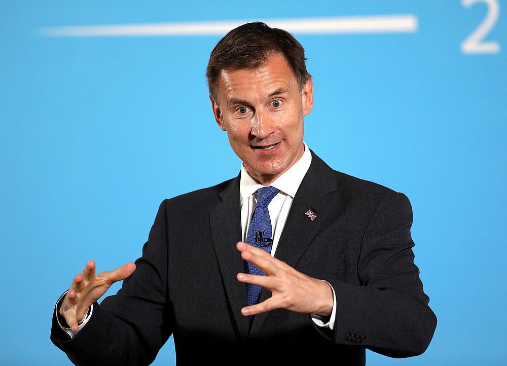 British Foreign Secretary Jeremy Hunt, a leadership candidate for the Conservative Party, gestures during a hustings event in Belfast, Northern Ireland July 2, 2019. u00e2u20acu201d Reuters pic