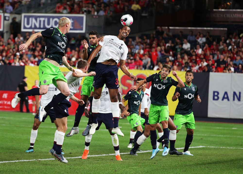 Liverpoolu00e2u20acu2122s Joel Matip (centre) in action against Sporting CP during their pre-season friendly match at the Yankee Stadium, New York on July 24, 2019. u00e2u20acu201d AFP pic