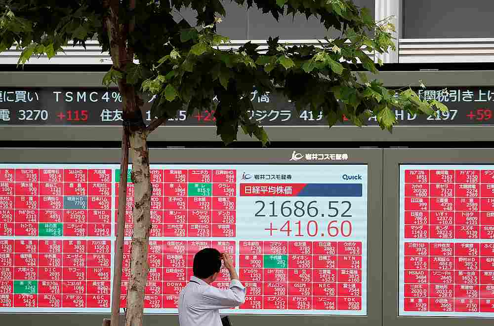 A man looks at a stock quotation board outside a brokerage in Tokyo, Japan July 1, 2019. u00e2u20acu201d Reuters pic