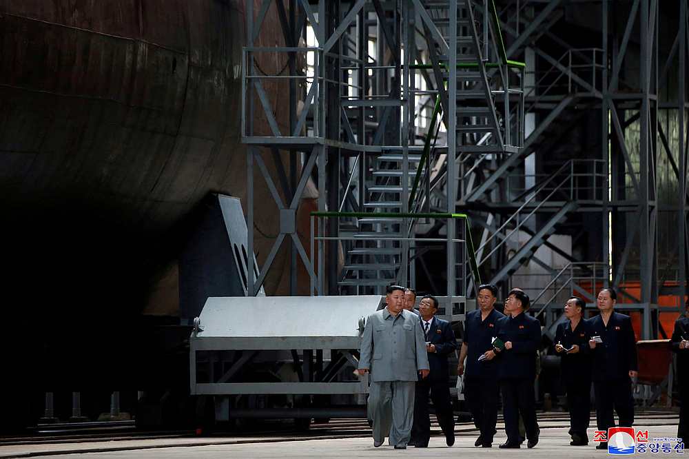 North Korean leader Kim Jong-un visits a submarine factory in an undisclosed location in this undated picture released July 23, 2019. u00e2u20acu201d KCNA pic via Reuters