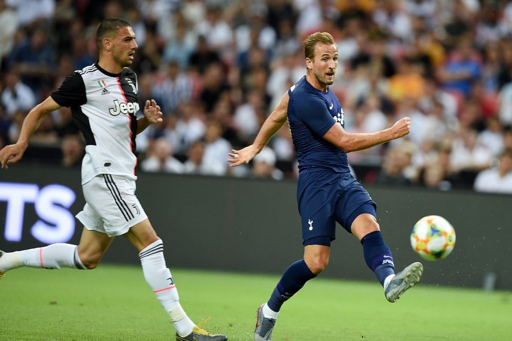 Tottenham Hotspur's Harry Kane (right) kicks the ball during the International Champions Cup match between Juventus and Tottenham Hotspur in Singapore on July 21, 2019. u00e2u20acu201d AFP pic