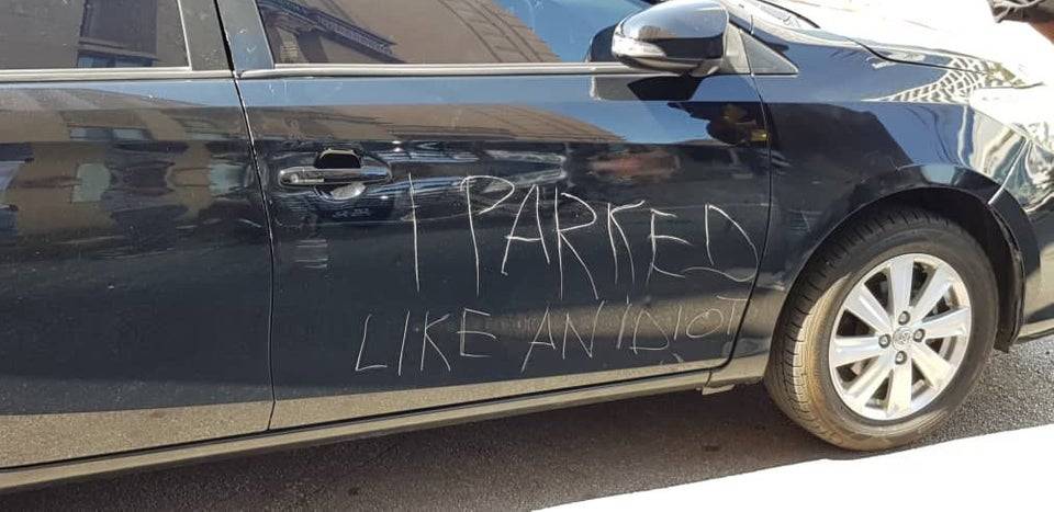 A car owner in Kuching had his vehicle vandalised for blocking the exit of a serviced apartment. u00e2u20acu201d Picture via Reddit/u/labeliu