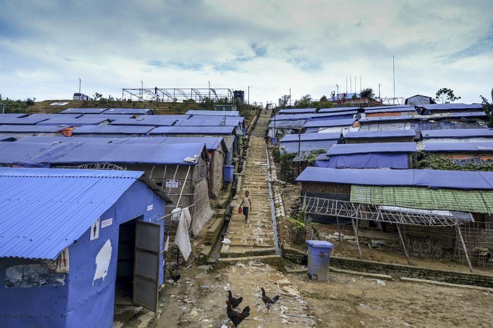 A Rohingya child walks down from a hill at Kutupalong refugee camp in Ukhia on July 24, 2019. u00e2u20acu201d AFP pic