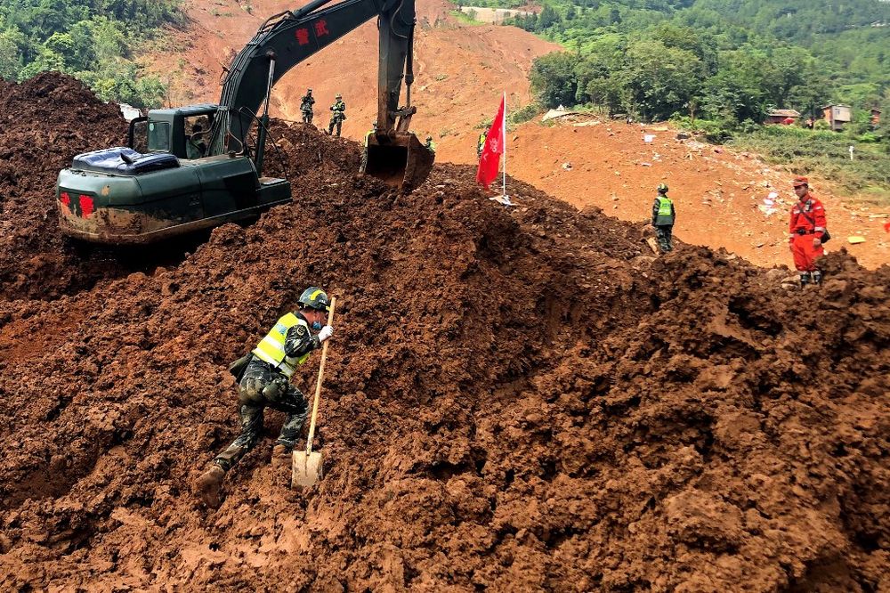 Rescuers search for survivors at the site of a landslide in Liupanshui in Chinau00e2u20acu2122s southwestern Guizhou province on July 26, 2019. u00e2u20acu201d AFP pic