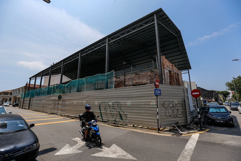 In the 1800s, the godowns faced the waterfront and were used as accommodation for new immigrants from China who were in transit to the tin mines in South Thailand. — Picture by Sayuti Zainudin