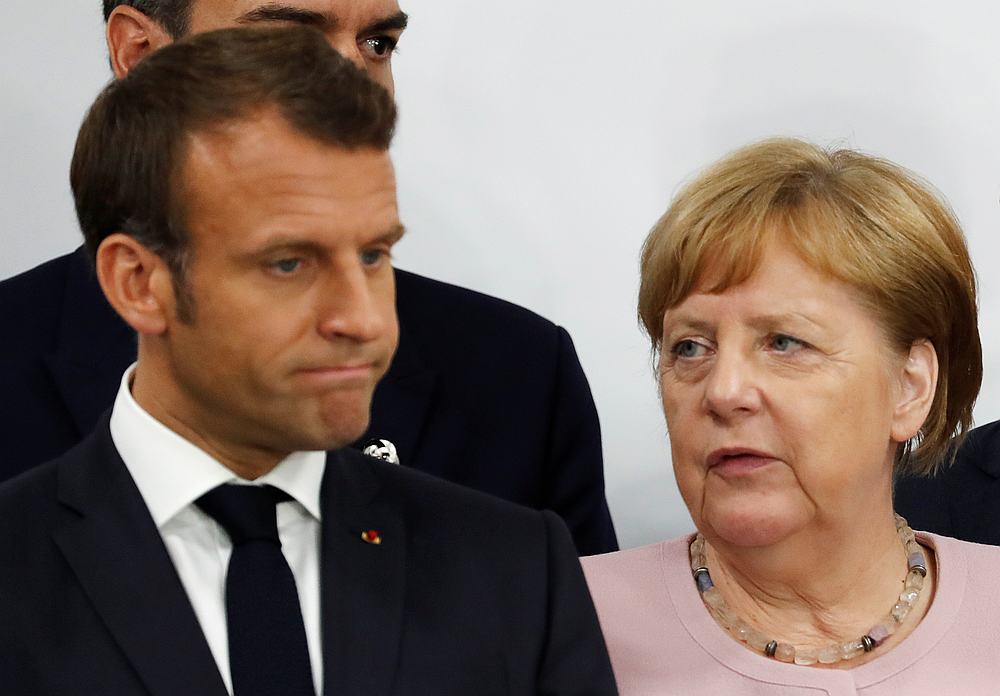 France's President Emmanuel Macron and Germanyu00e2u20acu2122s Chancellor Angela Merkel during a news conference at the G20 summit in Osaka, Japan June 29, 2019. u00e2u20acu201d Reuters pic