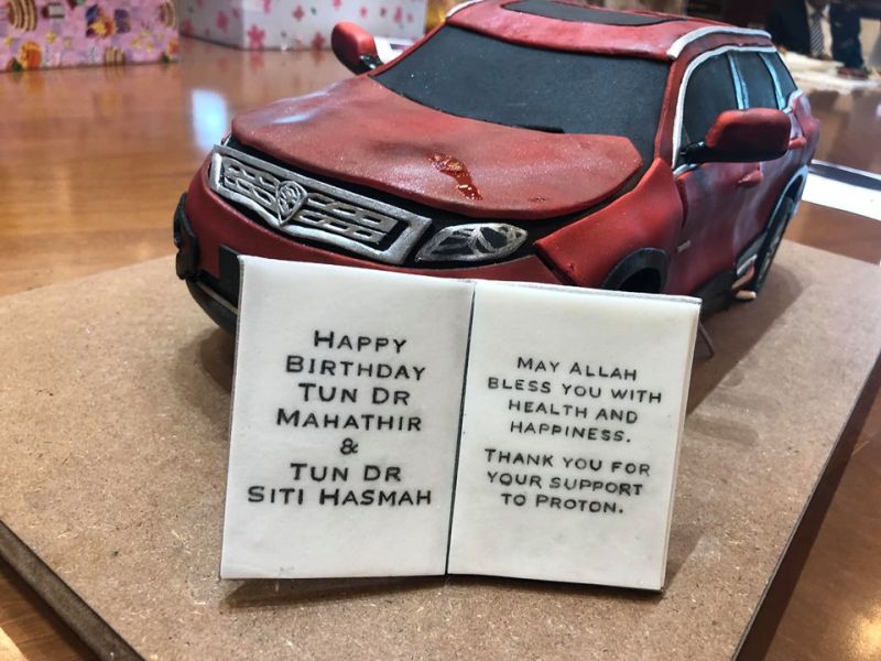Dr Mahathir's aide Ikmal Mohamad had earlier shared a photo of a birthday cake in the form of Protonu00e2u20acu2122s X70 on Facebook. 