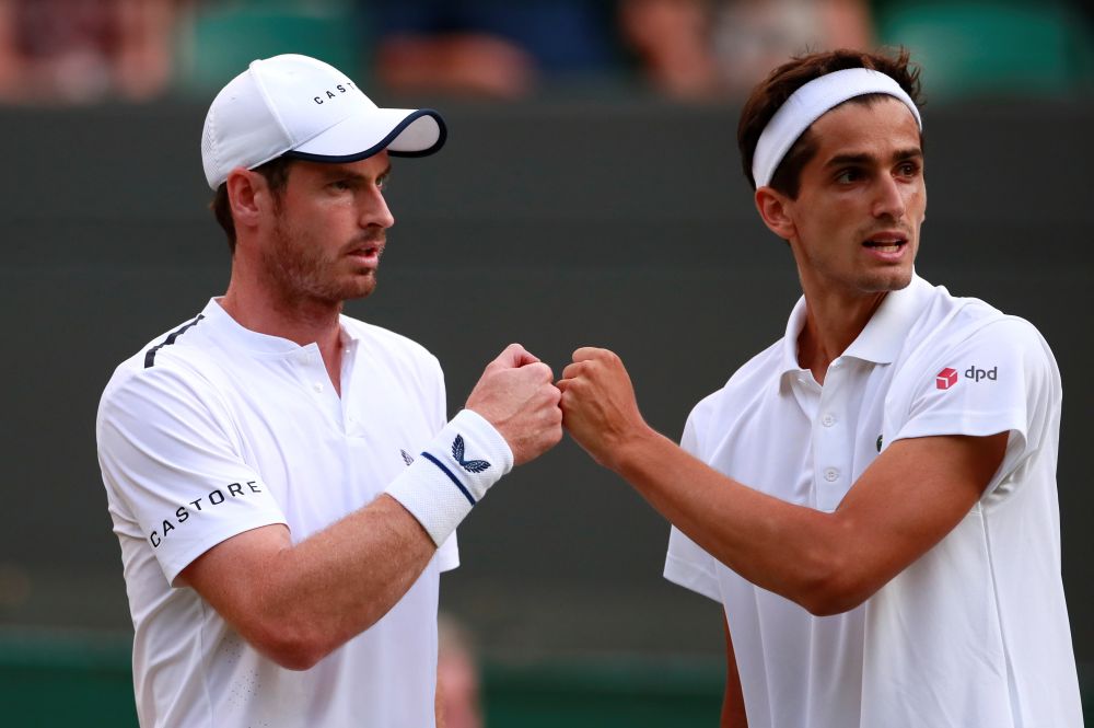 Britain's Andy Murray (left) and France's Pierre-Hugues Herbert during their first round double's match against Romania's Marius Copil and France's Ugo Humbert. u00e2u20acu201d Reuters pic