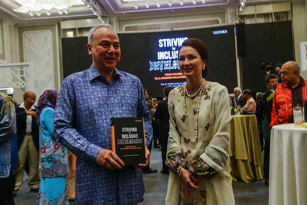 Sultan Nazrin Shah and the Raja Permaisuri Perak, Tuanku Zara Salim, during the launch of the u00e2u20acu02dcStriving for Inclusive Developmentu00e2u20acu2122 book The St Regis Kuala Lumpur July 14, 2019. u00e2u20acu201d Picture by Hari Anggara