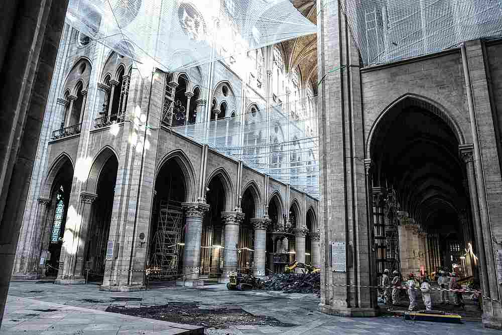 A picture shows damage on the nave and rubble during preliminary work in the Notre-Dame de Paris Cathedral on July 17, 2019. u00e2u20acu201d AFP pic