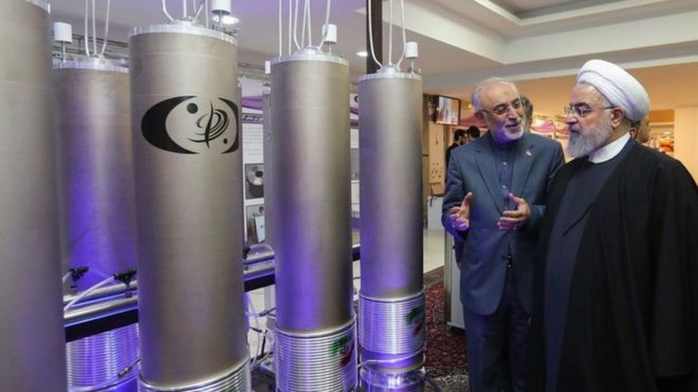 Iranian President Hassan Rouhani (right) inspecting a nuclear facility early 2019. u00e2u20acu201d AFP pic