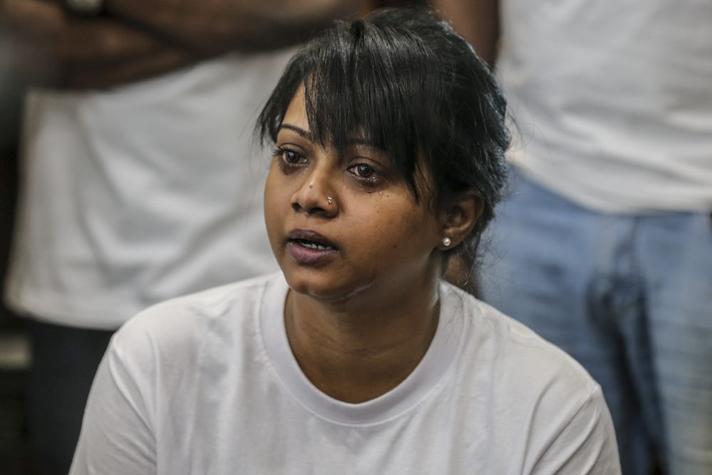 P. Pannir Selvam's sister Angelia Pranthaman speaks during a press conference in Petaling Jaya July 5, 2019. — Picture by Firdaus Latif